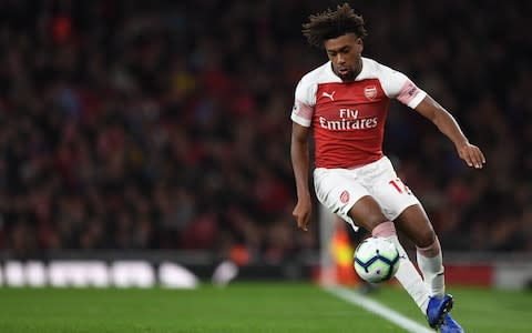 Iwobi controls the ball - Iwobi was part of Arsenal's 10th consecutive win on Monday night - Credit: Getty Images