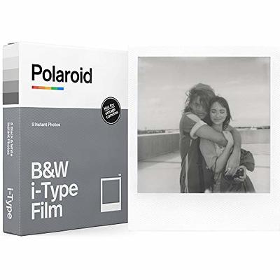 Polaroid Originals Onestep+ White and Black rainbow camera with i-type 600  film and Bluetooth is connected to the phone.