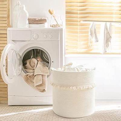 Spacious laundry room with window and lots of storage baskets