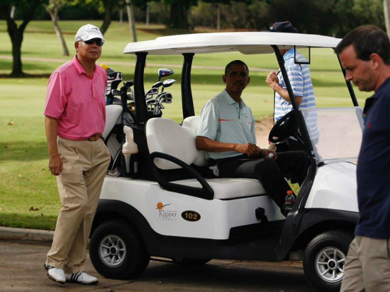 Former prime minister Datuk Seri Najib Razak and former US president Barack Obama get in their golf cart after playing on the 18th green at the Clipper Golf course in Hawaii in this file picture dated December 25, 2014. — Reuters pic