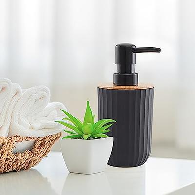 Dracelo 4-Piece Bathroom Accessory Set with Toothbrush Holder, Soap Dispenser, Cotton Jar, Tray in Black