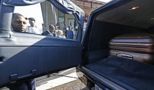 An attendant closes the door to the hearse with the casket bearing the body of blues legend B.B. King in front of the B.B. King Museum and Delta Interpretive Center after a day of public viewing, Friday, May 29, 2015 in Indianola, Miss. The visitation comes a day before the funeral for the man who influenced generations of singers and guitarists. (AP Photo/Rogelio V. Solis)