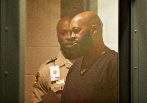 FILE - In this Oct. 30, 2014 file photo, rap music mogul Marion "Suge" Knight appears in court on a traffic warrant, in Las Vegas following his arrest as a fugitive in a California robbery case. A lawyer for Knight says the Death Row Records founder was at the wheel of a car that struck two men, killing one, in a Los Angeles suburb. The accident in Compton occurred shortly before 3 p.m. Thursday, Jan. 29, 2015. (AP Photo/John Locher, File)