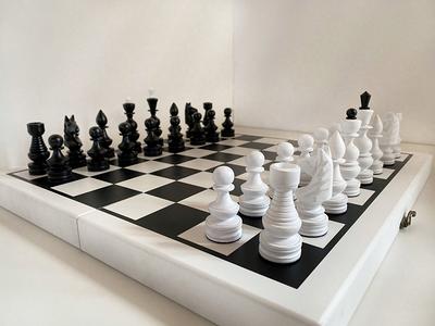 CHESS BOARD Chess board in ceramic, black and white with…