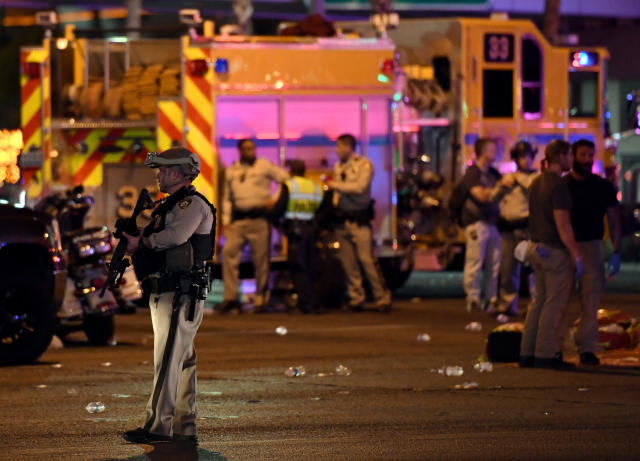 A police officer stands in the intersection of Las Vegas Boulevard and Tropicana Avenue on Oct. 2 after the mass shooting. (Ethan Miller via Getty Images)