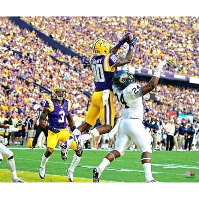 Clyde Edwards-Helaire LSU Tigers Unsigned White Jersey Running Photograph