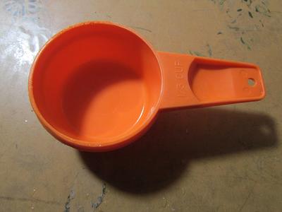 Orange Tupperware Measuring Spoons 