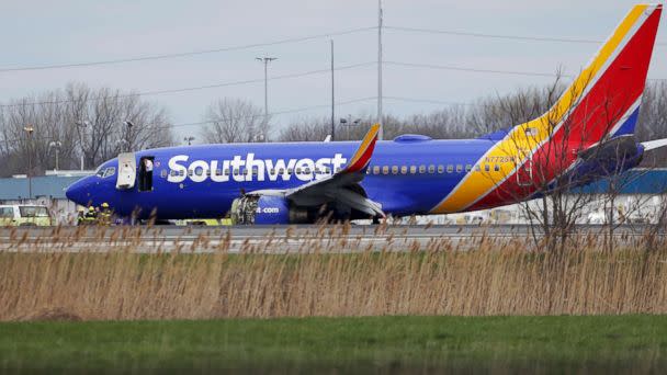 PHOTO: A Southwest Airlines plane sits on the runway at the Philadelphia International Airport after it made an emergency landing in Philadelphia, April 17, 2018. (David Maialetti /The Philadelphia Inquirer via AP)