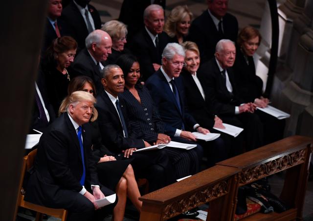 From left, President Donald Trump, First Lady Melania Trump, Barack Obama, Michelle Obama, Bill Clinton, Hillary Clinton, Jimmy Carter, and Rosalynn Carter attend the State Funeral of former President George H.W. Bush at the Washington National Cathedral in Washington, Dec. 5, 2018. 