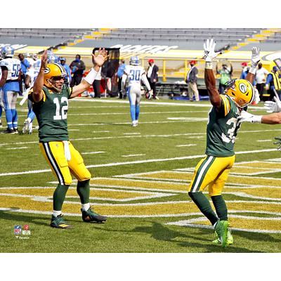 Christian Watson Green Bay Packers Unsigned Celebrates Touchdown Photograph