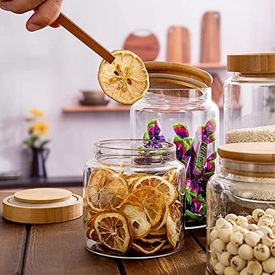 Small glass storage jar with bamboo lid