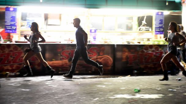 PHOTO: People run from the Route 91 Harvest country music festival after gun fire was heard, Oct. 1, 2017 in Las Vegas. (David Becker/Getty Images)