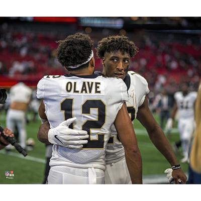 Chris Olave & Michael Thomas New Orleans Saints Unsigned Embracing in White  Jerseys Photograph - Yahoo Shopping