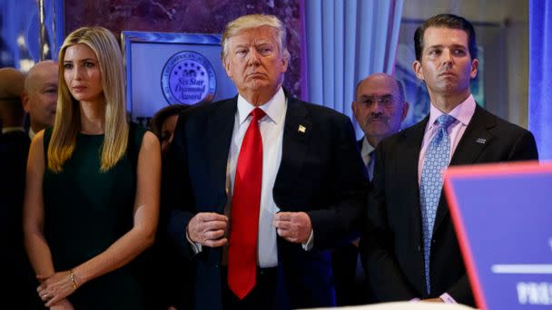 PHOTO: In this Jan. 11, 2017, photo, President-elect Donald Trump, center, stands next to Allen Weisselberg, second from left, Donald Trump Jr., right and Ivanka Trump, left, at a news conference in the lobby of Trump Tower in New York. (AP)