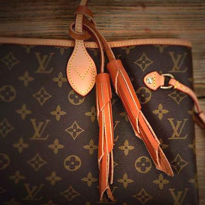 lv purse tassel