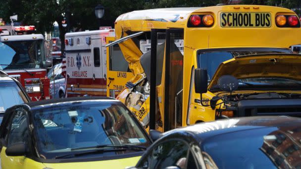 PHOTO: A damaged school bus at the scene where a truck drove into a bike path, Oct. 31, 2017, in New York City. (Mark Lennihan/AP)