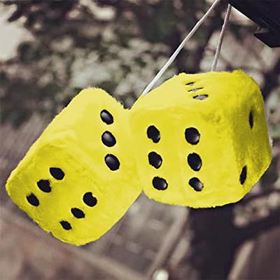 Pair Of Fluffy Dice On A String, Hanging From A Rear View Mirror