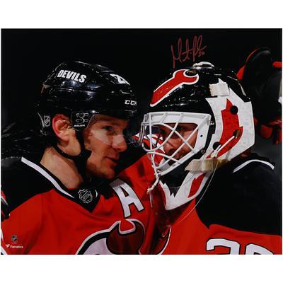 Nico Hischier New Jersey Devils Autographed 8 x 10 Red Jersey with Puck  Photograph