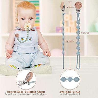 Designer pacifier clips and clothing for babies.