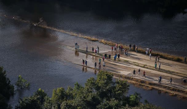 PHOTO: People venture out to see the flooded areas near their homes in Houston, Aug. 29, 2017. (Marcus Yam/Los Angeles Times via Polaris)