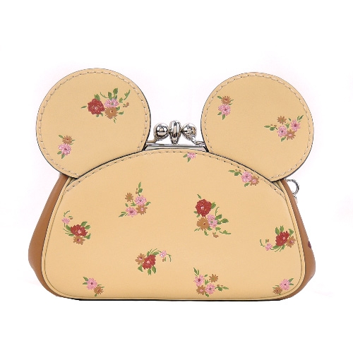 COACHxMINNIE米妮聯名款復古花印耳朵造型珠扣大手包(淺黃)