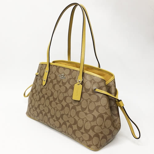 COACH 經典立體馬車多夾層托特包(芥末黃)