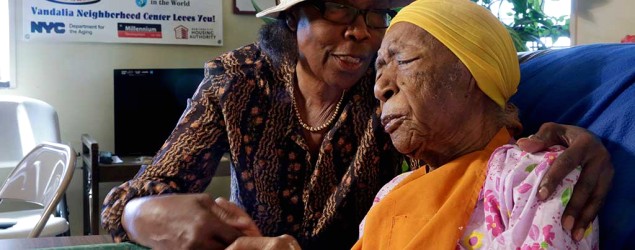 Susannah Mushatt Jones, right, sits with her niece, Lois Judge. (AP)