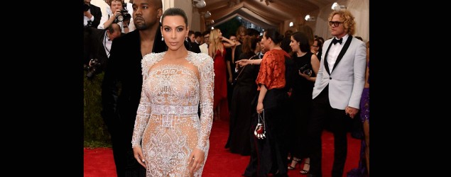 Kanye West and Kim Kardashian at the 2015 Met Gala. Her dress was created by Peter Dunas for Roberto Cavalli. (Getty)