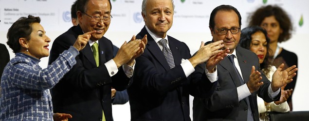 UN climate chief Christiana Figueres, UN Secretary General Ban ki-Moon, French Foreign Minister Laurent Fabius, and French President Francois Hollande applaud the final conference at the COP21. (Francois Mori/AP)