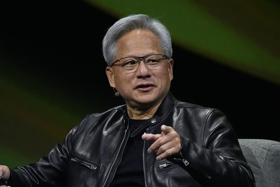 Jensen Huang, CEO of Nvidia, makes a point as a keynote speaker at SIGGRAPH 2024. (AP Photo/David Zalubowski)