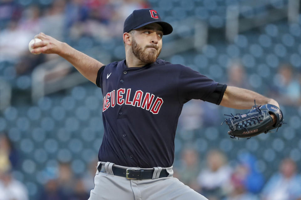 Cleveland Guardians starting pitcher Aaron Civale throws to a Minnesota Twins batter during the first inning of a baseball game Friday, May 13, 2022, in Minneapolis. (AP Photo/Bruce Kluckhohn)
