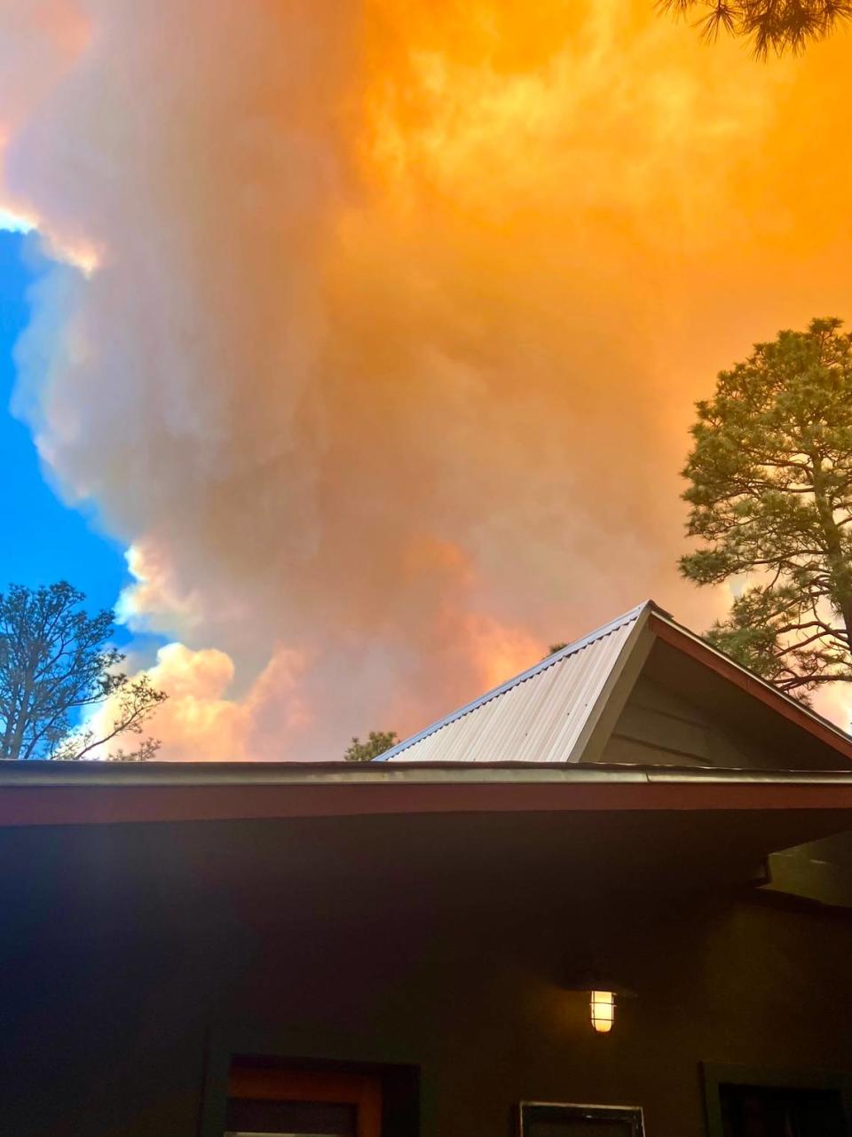 Flames leap above Joe Corpening’s house in Ruidoso, New Mexico in a fire May 18, 2024. The house was eventually destroyed.