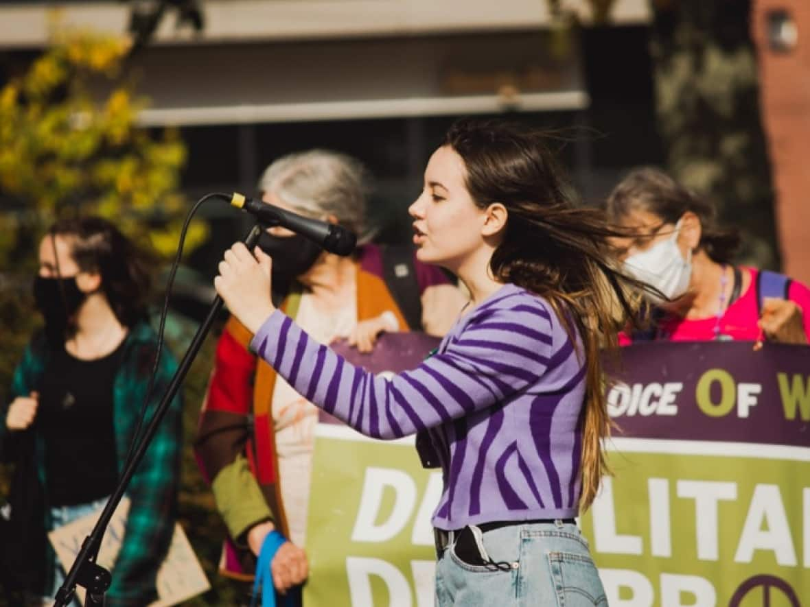 Amelia Penney-Crocker is shown speaking at a climate action rally in Halifax on Oct. 22, 2021. (Amelia Penney-Crocker - image credit)