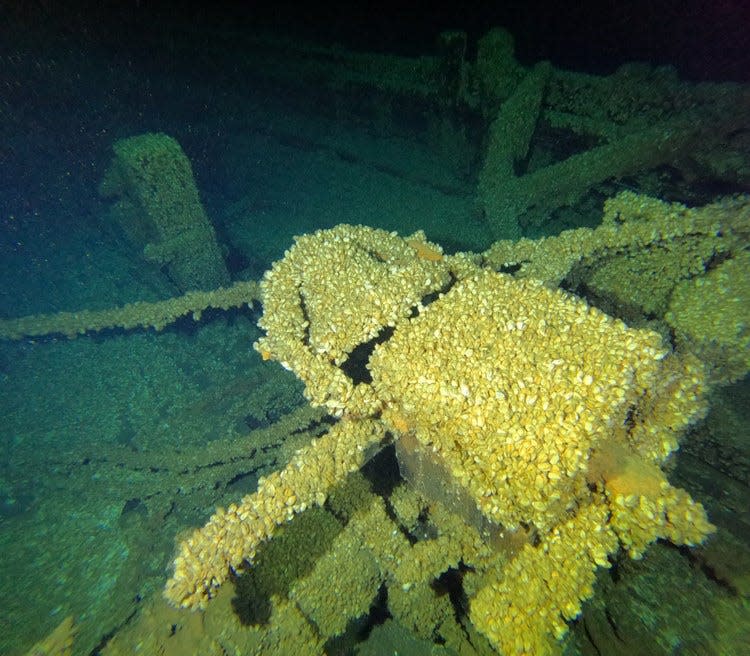 The bell on the deck of the wreck of the Trinidad, photographed during a dive to document the remains.