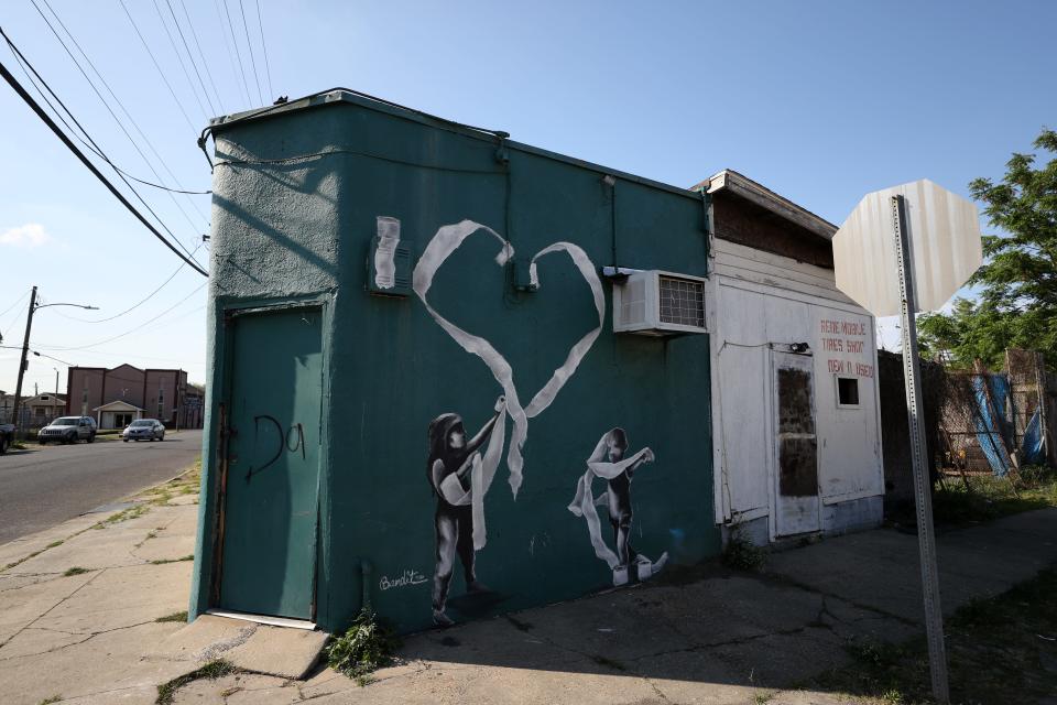 A painting by the graffiti artist Bandit of two children playing with toilet paper is seen on an abandoned building in New Orleans on April 03, 2020. A USA TODAY analysis of rental allocation to all 50 states found Alaska, Vermont and Wyoming will receive substantially more money per eligible renter than other states.