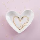 <p><strong>kateaspen</strong></p><p>kateaspen.com</p><p><strong>$4.40</strong></p><p>This ceramic heart-shaped dish features a white and gold design and the word "love" engraved in the center. They can use it to display their jewelry, coins or small items. </p>