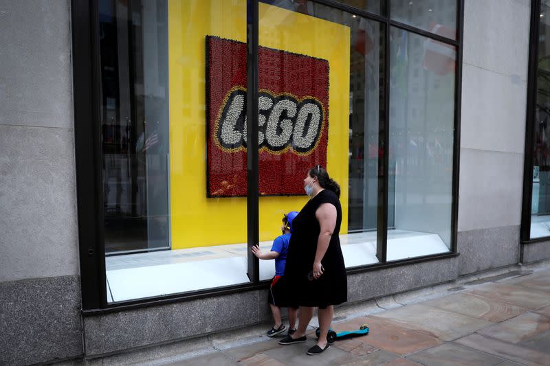 FILE PHOTO: Closed luxury retail stores on 5th Avenue in Manhattan during the outbreak of the coronavirus disease (COVID-19) in New York