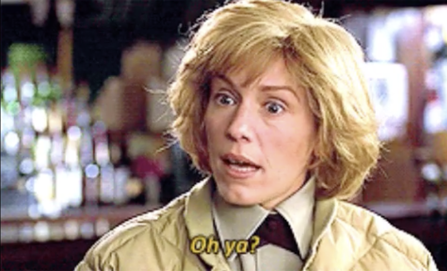 Frances McDormand as Marge Gunderson from the movie "Fargo," wearing a beige sheriff's uniform with a surprised expression. Text on image: "Oh ya?"