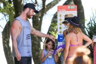 Chris consoles his little pal after her jellyfish ordeal. Aww!