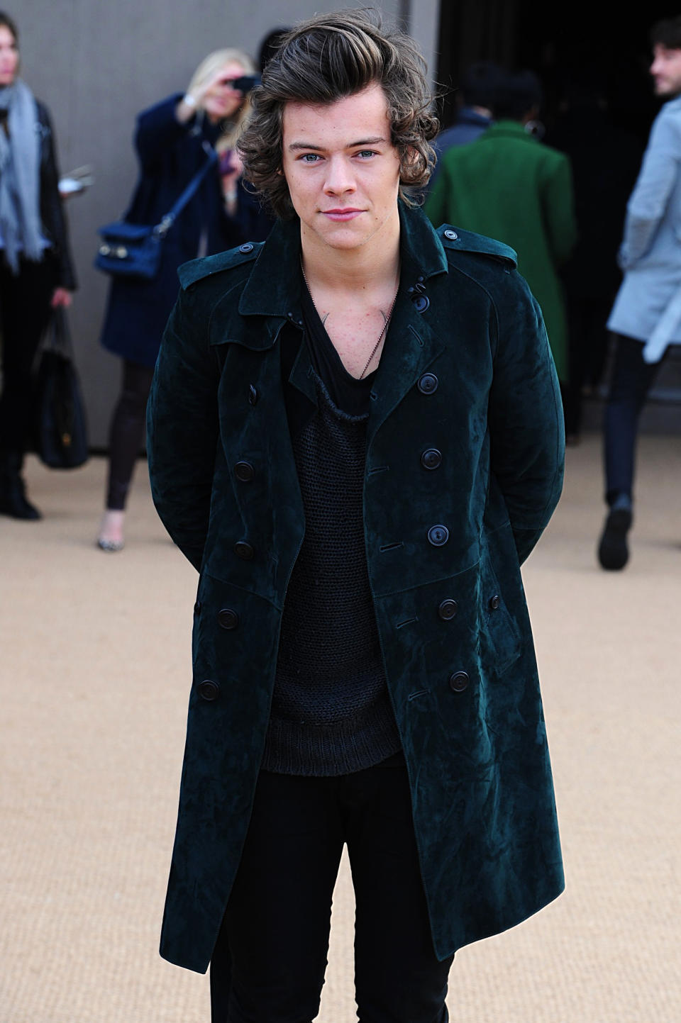 One Direction's Harry Styles arrives for the Burberry Prorsum autumn/winter 2014 London Fashion Week show at Kensington Gardens, London Monday Feb. 17, 2014. (AP Photo/ Ian West/PA) UNITED KINGDOM OUT