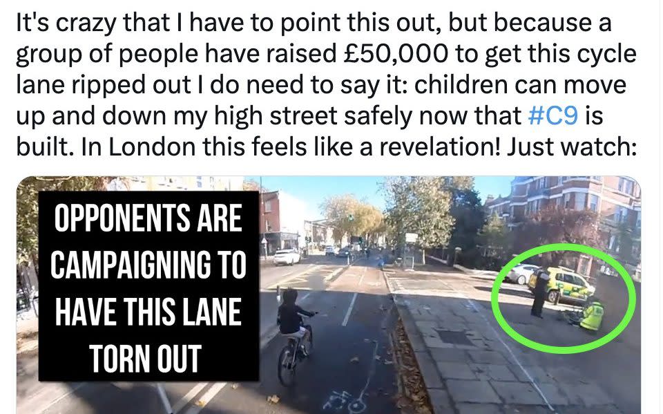 On Mr Vine’s video, the yellow-and-blue markings of a fast-response police car become visible as police and paramedics tend to an injured cyclist - Twitter