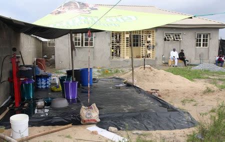 A clandestine methamphetamine laboratory is seen inside a compound at Monkey Village in Lagos, Nigeria, in this undated photograph taken from a National Drug Law Enforcement Agency (NDLEA) powerpoint presentation provided to Reuters, July 9, 2015. REUTERS/NDLEA/Handout via Reuters