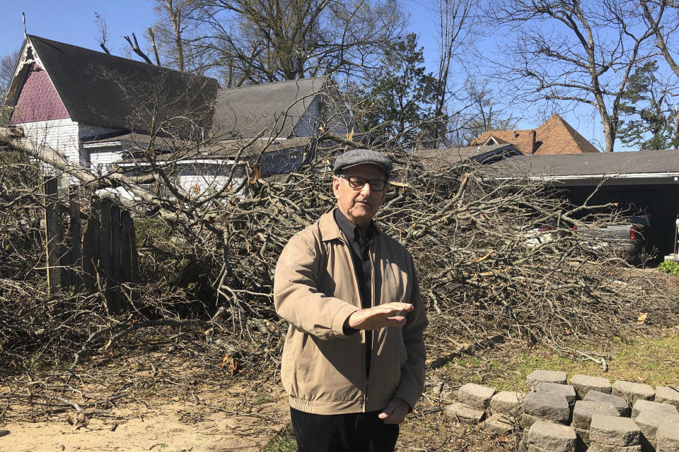J.W. Spencer speaks with a reporter outside his home about his experience during the tornado in Wynne, Ark., on Saturday, April 1, 2023. Unrelenting tornadoes that tore through parts of the South and Midwest that shredded homes and shopping centers. (AP Photo/Adrian Sainz)