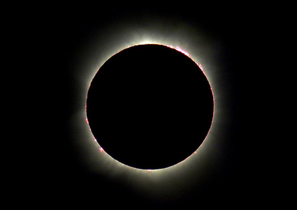 Baily's beads flare from the corona during Australia's first total solar eclipse in 26 years at Koolymilka north of the outback town of Woomera, Dec. 4, 2002, in central Australia.