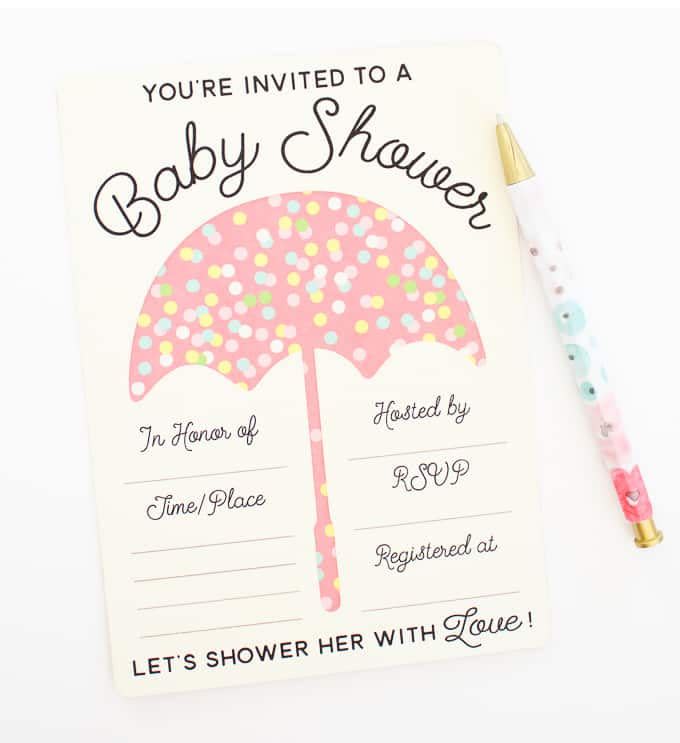 an umbrellafestooned invite is a great baby shower idea