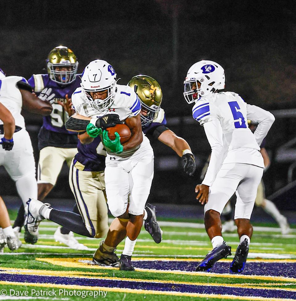 John Parker (1), one of the state's speediest receivers, returns for Dover.