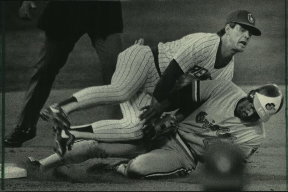 Milwaukee third baseman Randy Ready held on to the ball and tagged out Baltimore's Mike Young at third base during a game in 1984.