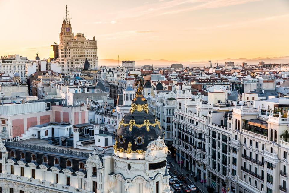 view of metropolis building from círculo de bellas artes, madrid, spain