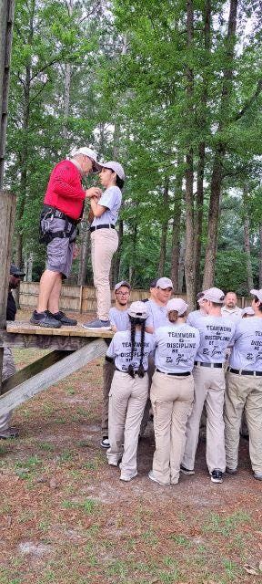 Trust fall exercise at Cadet Academy in Salemburg, NC.