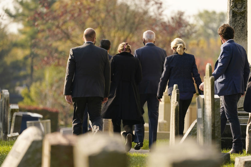 Democratic presidential candidate former Vice President Joe Biden and his wife Jill Biden, second from right, and granddaughter Finnegan Biden, third from left, leave mass at St. Joseph On the Brandywine Roman Catholic Church in Wilmington, Del., Sunday, Oct. 18, 2020. The Biden family walked to pay respects at his son Beau Biden's grave. (AP Photo/Carolyn Kaster)